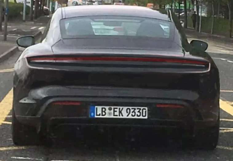 Porsche Taycan Taycan drops camo revealing headlights, tail lights, rear side window Taycan-drops-camo2