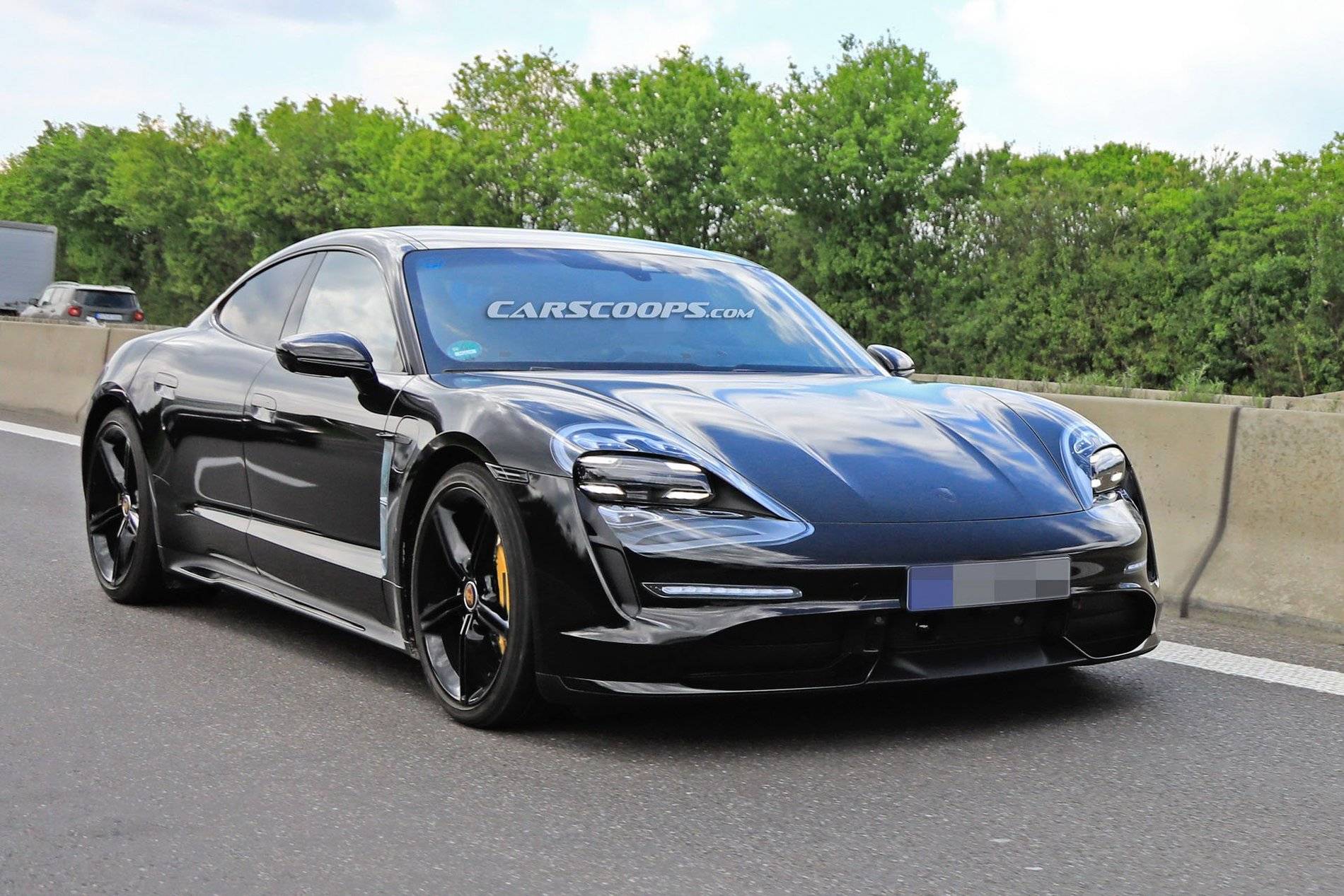 Porsche Taycan Taycan drops camo revealing headlights, tail lights, rear side window 2ec9145a-2021-porsche-taycan-16