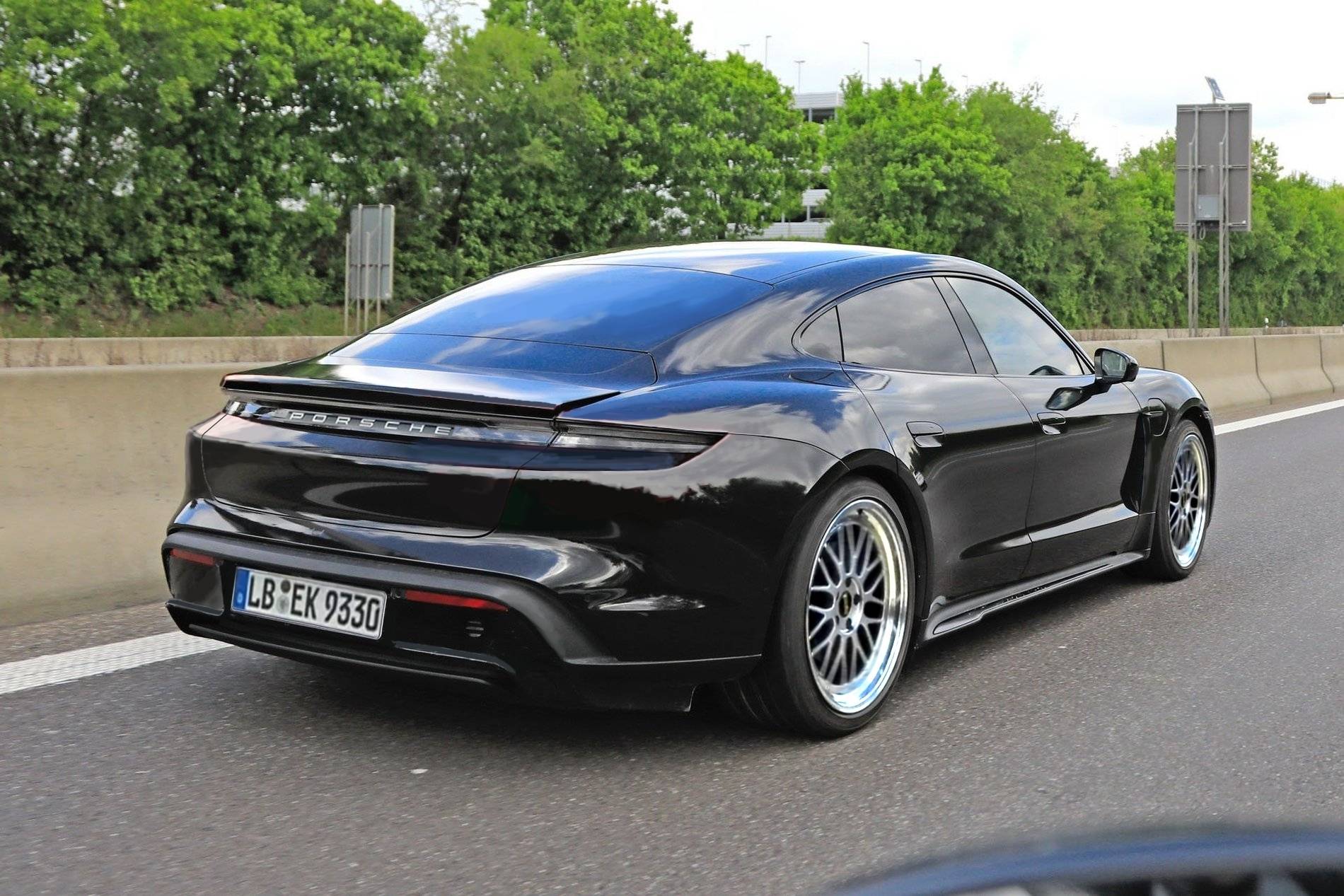 Porsche Taycan Taycan drops camo revealing headlights, tail lights, rear side window Side2