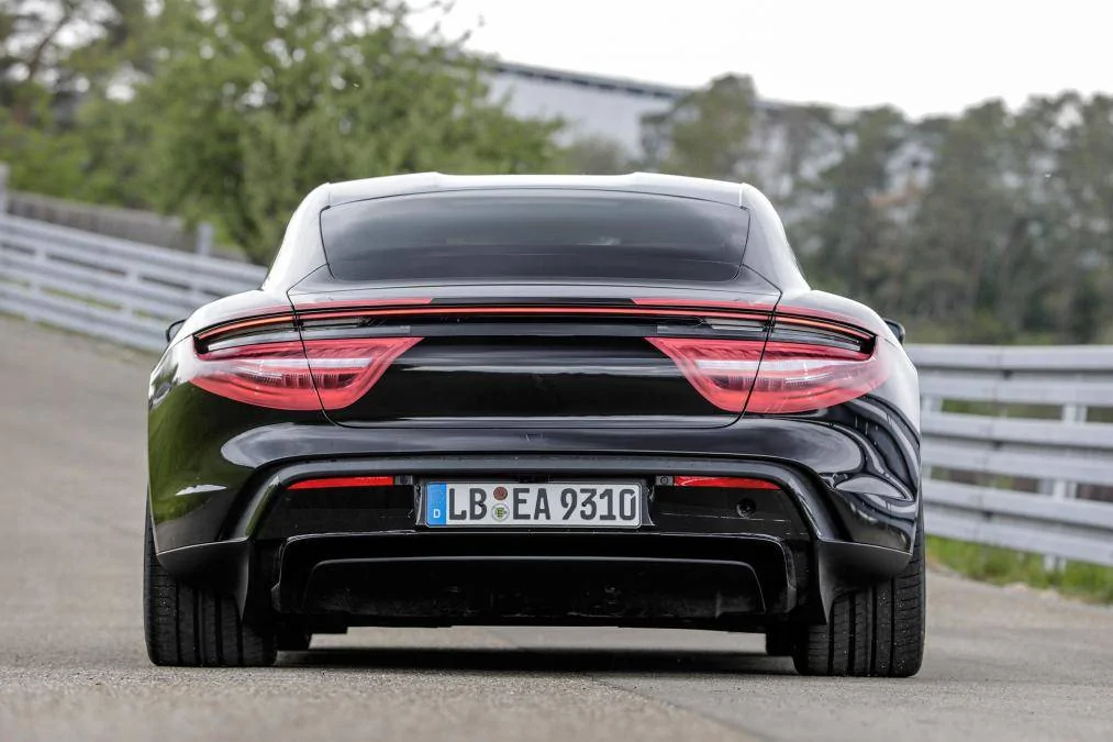 Porsche Taycan Taycan drops camo revealing headlights, tail lights, rear side window 12_12