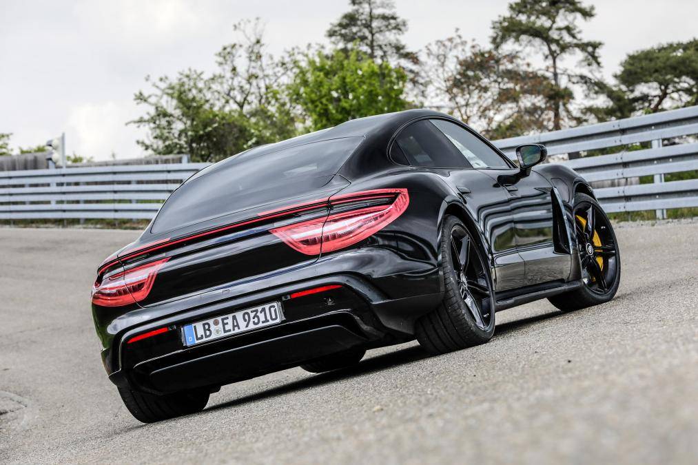 Porsche Taycan Taycan drops camo revealing headlights, tail lights, rear side window 09_13