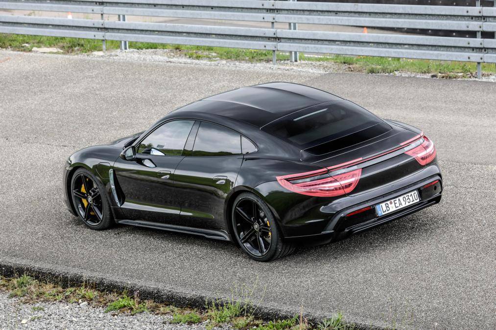 Porsche Taycan Taycan drops camo revealing headlights, tail lights, rear side window 10_13