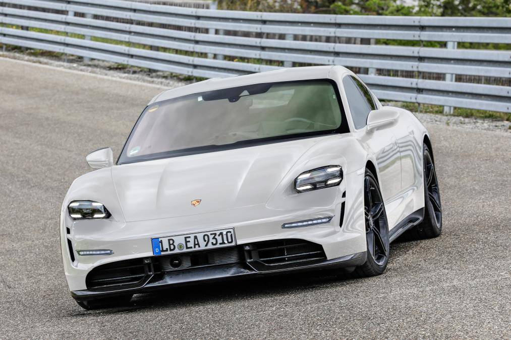 Porsche Taycan Taycan drops camo revealing headlights, tail lights, rear side window taycanwhite