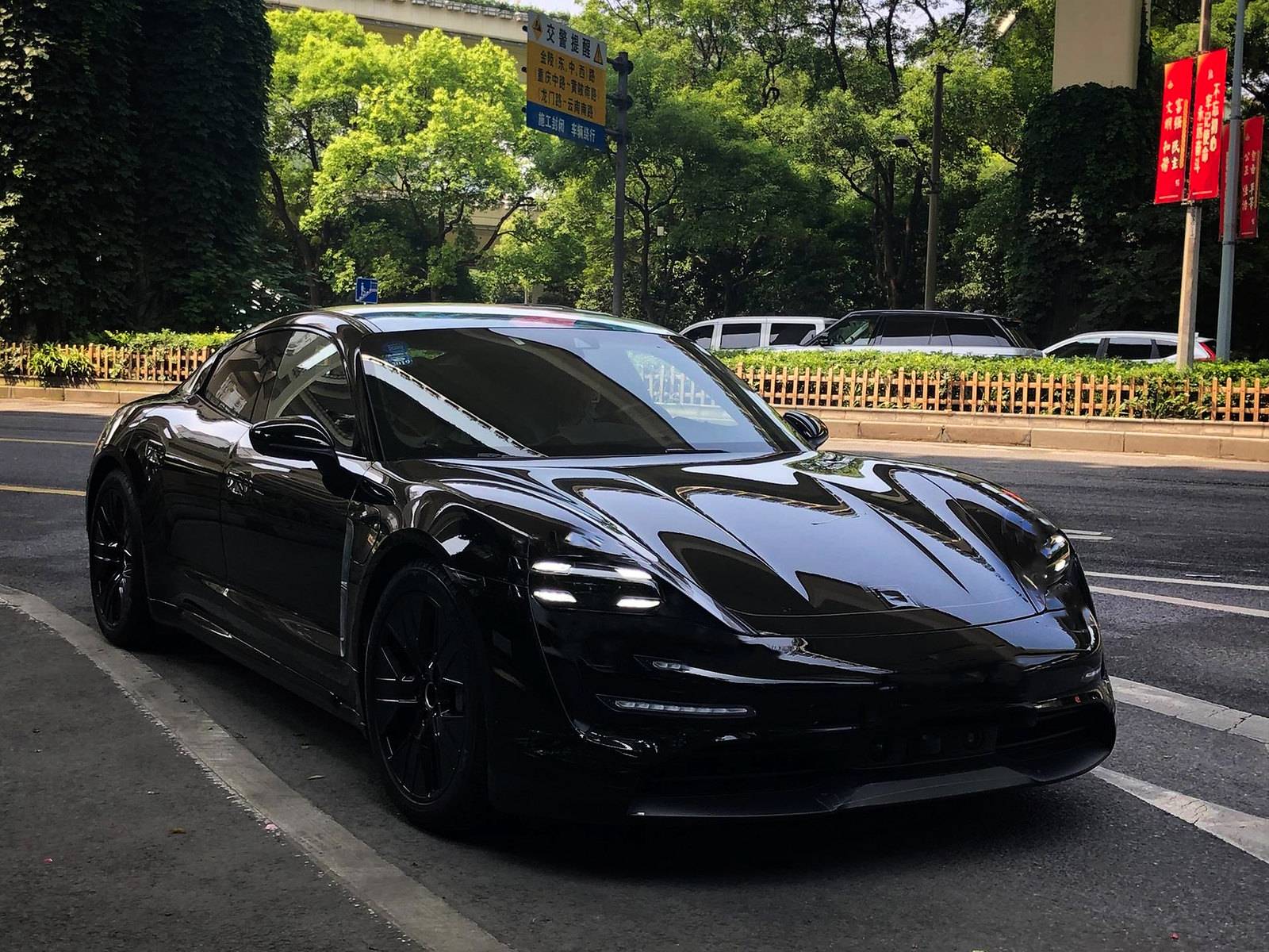 Porsche Taycan Taycan drops camo revealing headlights, tail lights, rear side window 48148371191_5cf5a01c4c_h