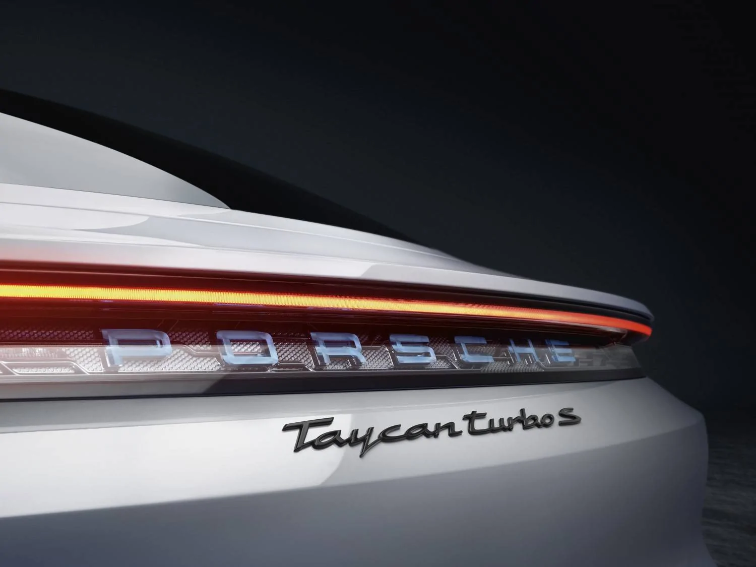 Porsche Taycan Rear blue Porsche logo in tailight PorscheTaycanReveal3
