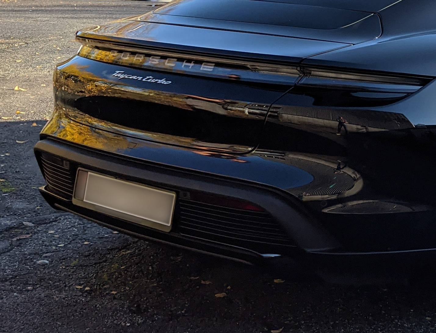 Porsche Taycan tinting red reflectors on rear bumper? PXL_20201028_103259602