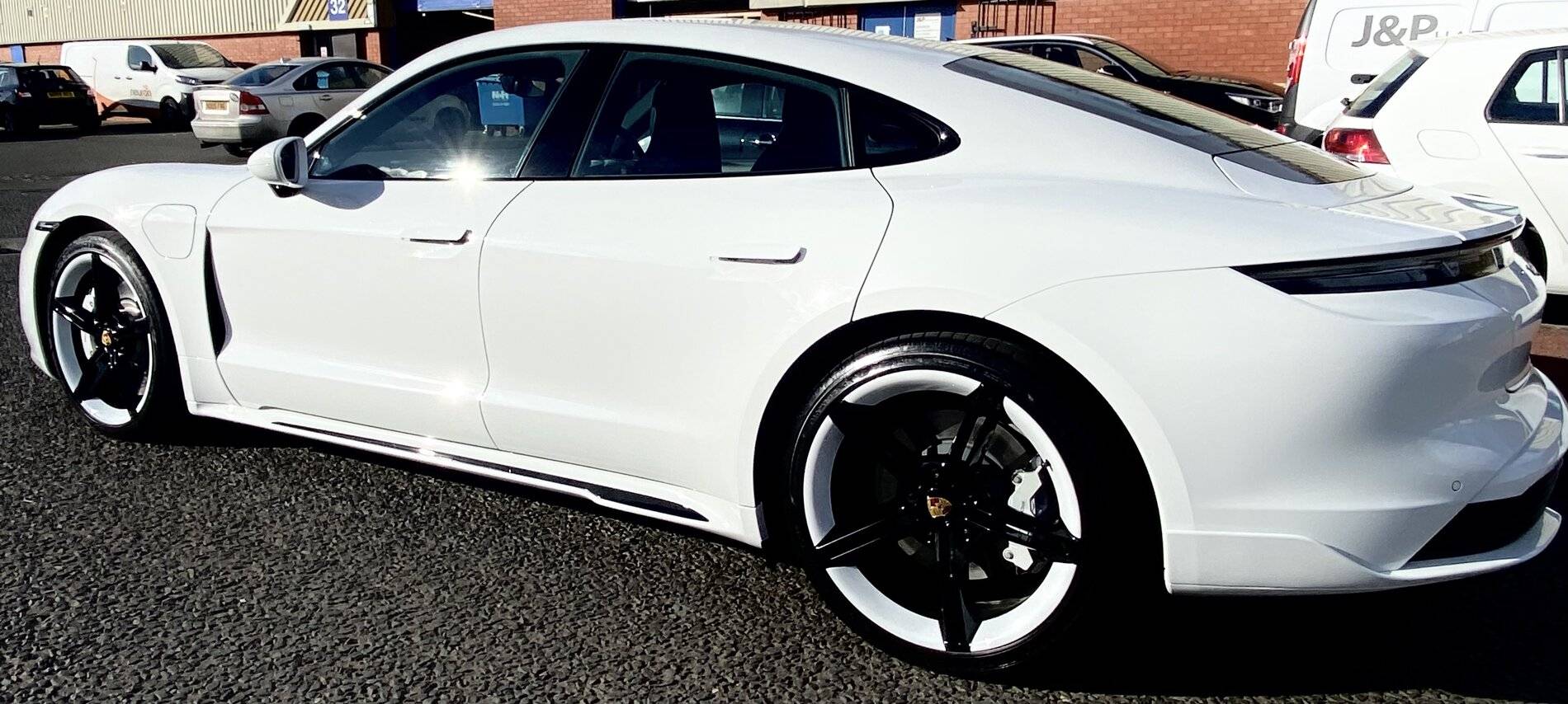 Porsche Taycan Gloss black paint on the plastic parts 6B4C03CC-B8E2-4176-B2CD-16DDE57074AC