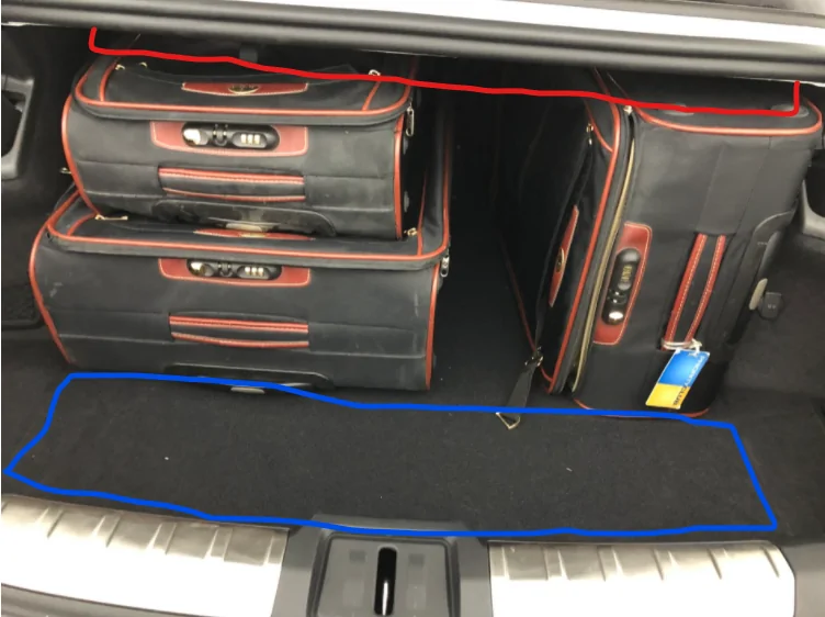 Porsche Taycan Can you fit 2 large check in luggage bags in the trunk? 1620231154275