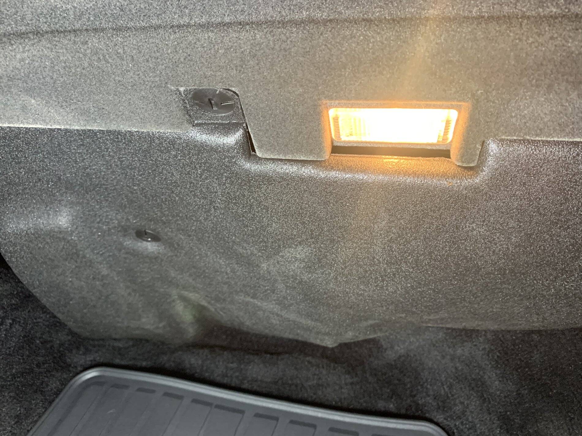 Porsche Taycan Front Passenger Footwell Lighting and Panel.  Missing Something? 64142B98-B72E-4948-B4E5-4C87E457D631