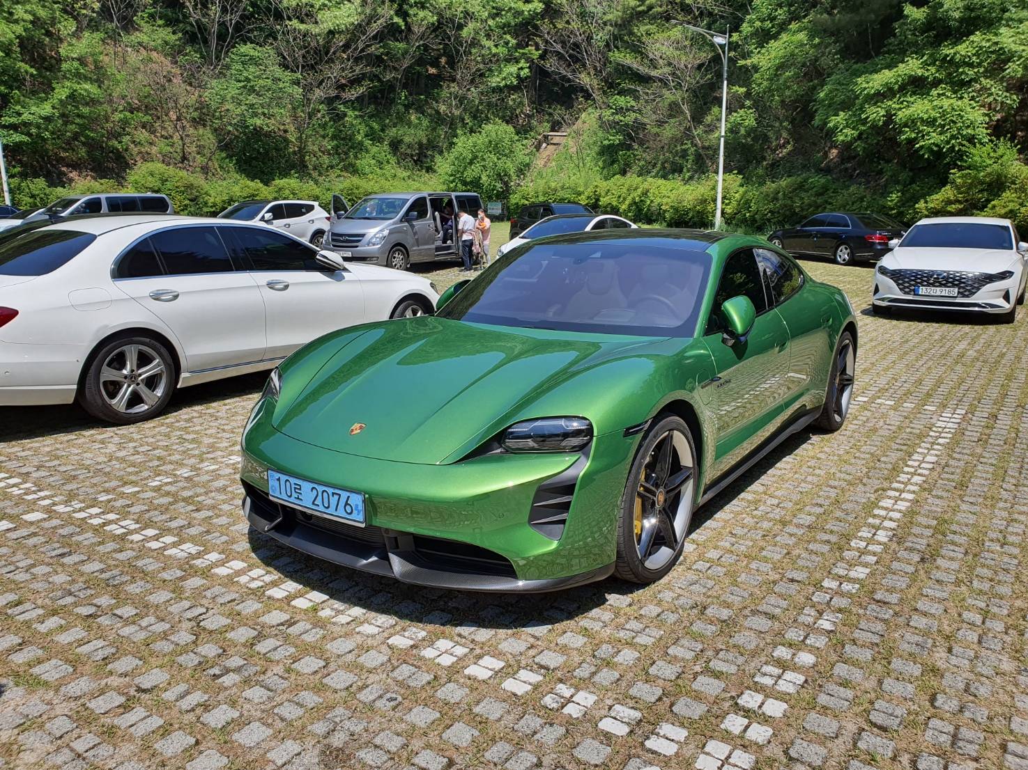 Porsche Taycan Has anyone seen/have beige interior on Mamba green Taycan? 20210519_113113