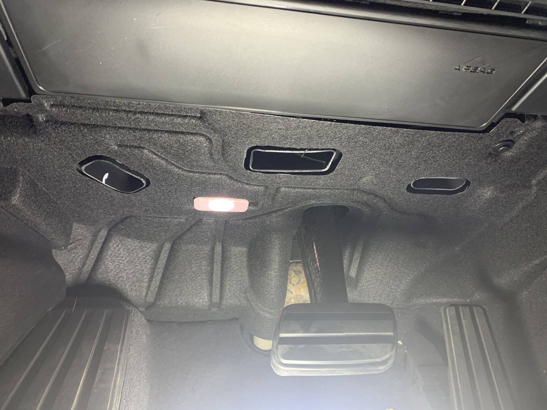 Porsche Taycan Front Passenger Footwell Lighting and Panel.  Missing Something? C49311E9-9B3D-4453-8D98-3C481C2721BD