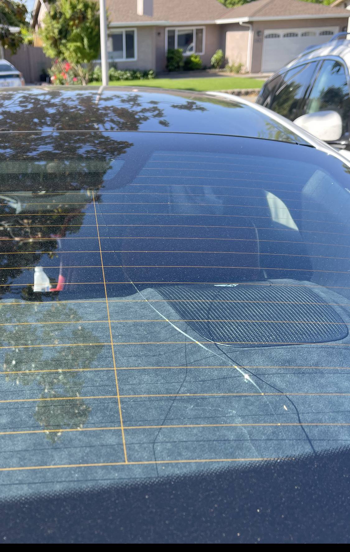 Porsche Taycan Crack in REAR window IMG_2626