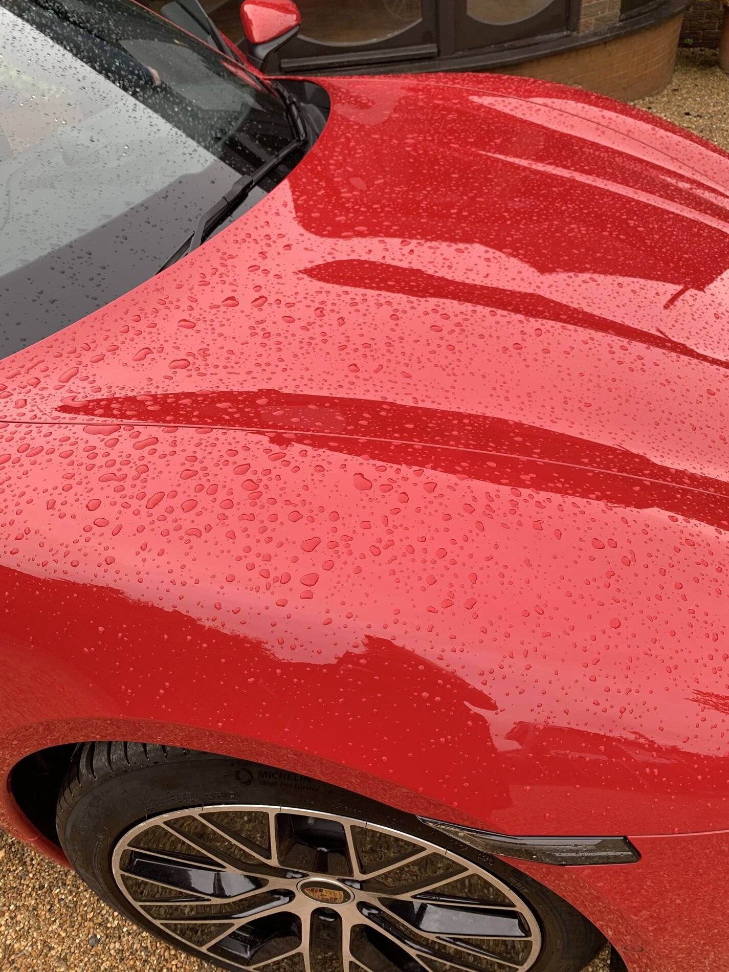 Porsche Taycan Red in the rain 46B6A3CC-101B-400B-A3A9-F87F16B6350A