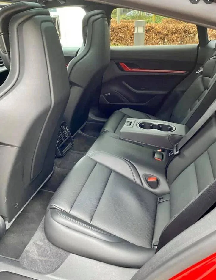 Porsche Taycan Rear 2 + 1 Seats -- does it have fold down arm rest with cup holder? 1627554130181