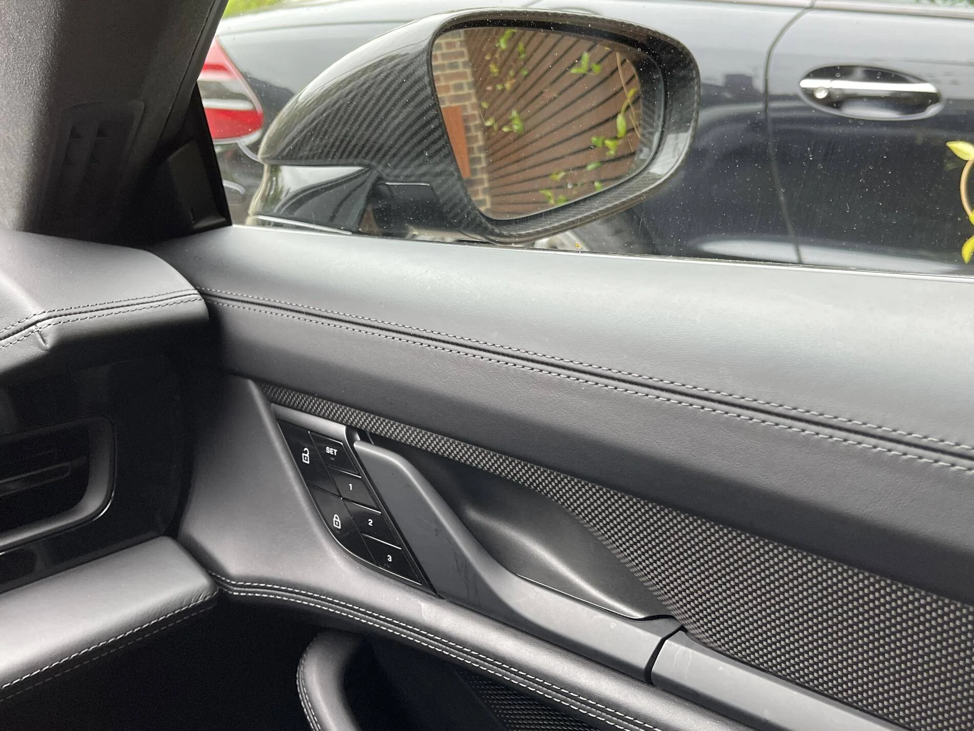 Porsche Taycan Heated steering wheel with carbon trim, anyone? tempImagev11Sk