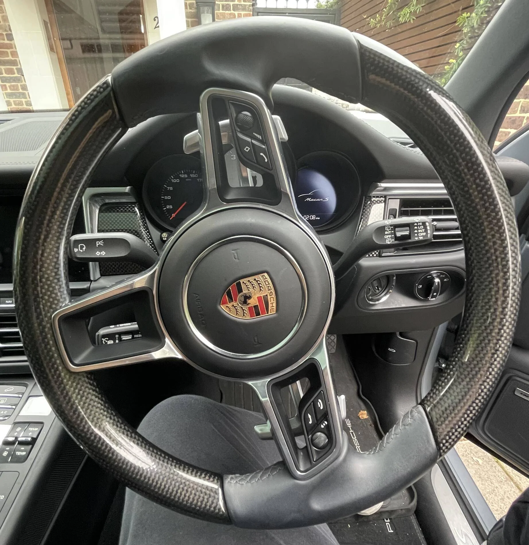 Porsche Taycan Heated steering wheel with carbon trim, anyone? tempImageopUUd3