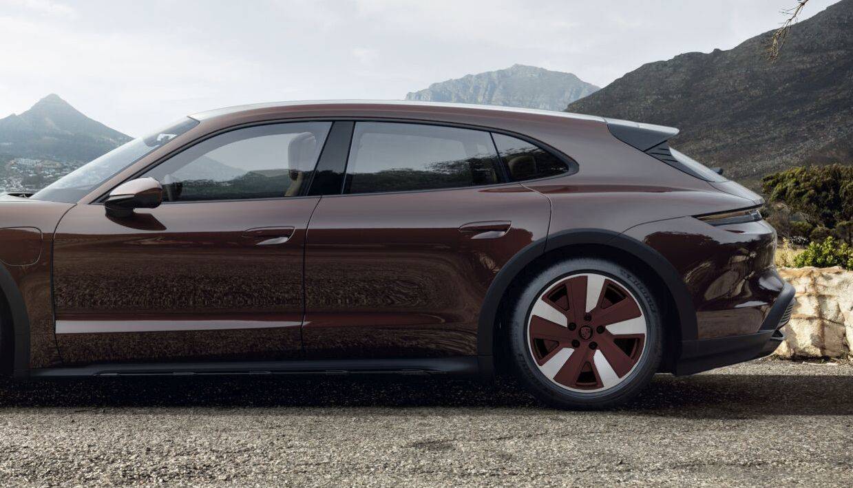 Porsche Taycan Had my wheels redone to match the car color (Gentian Blue). brown_back