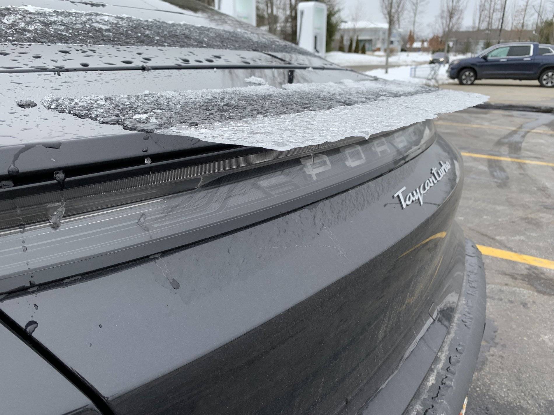 Porsche Taycan New Retractable Glass Spoiler. IMG_1859