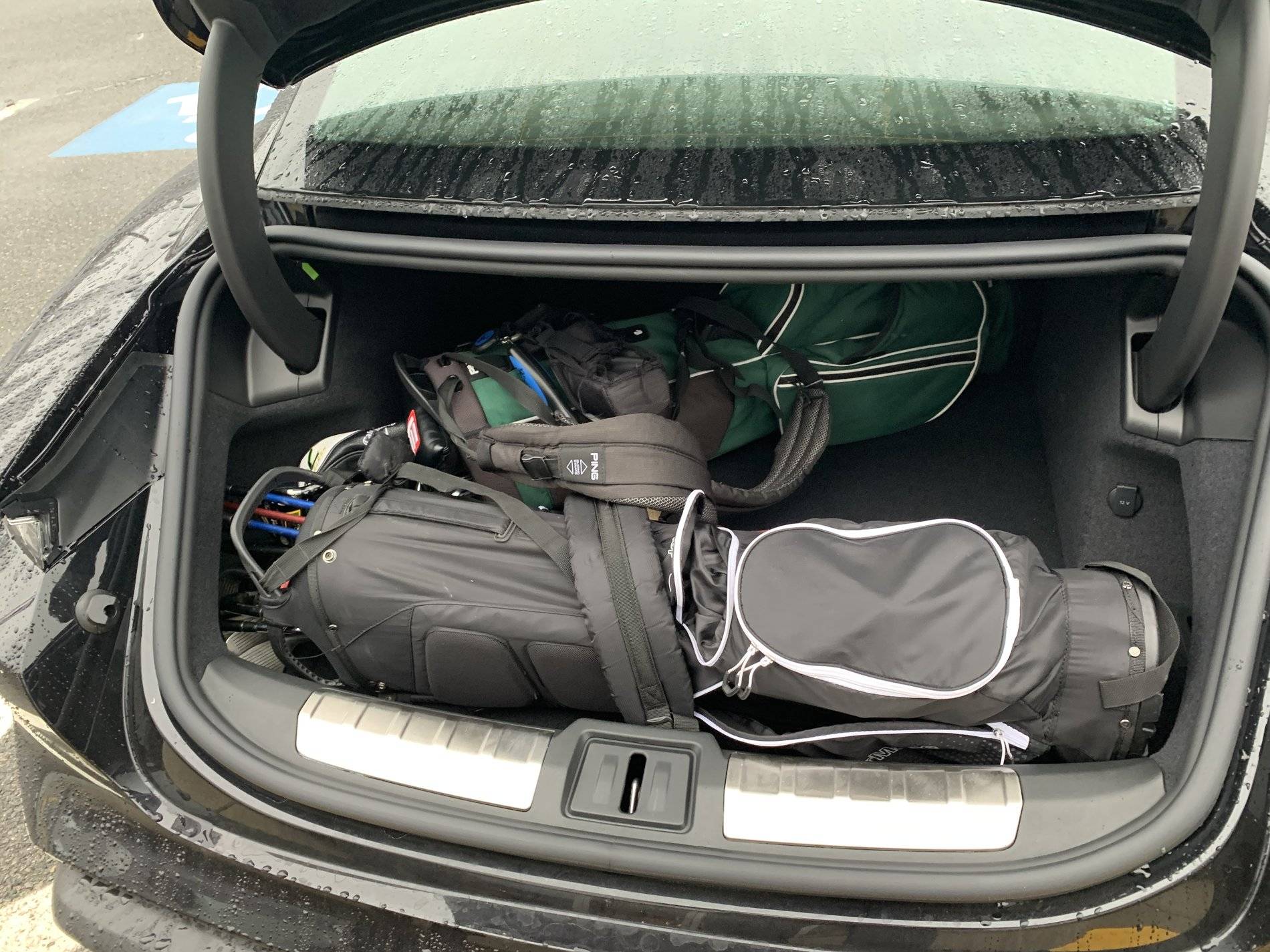 Porsche Taycan Golf clubs in the boot EB45BACF-0CF0-485B-A346-5E8A53ED4C81