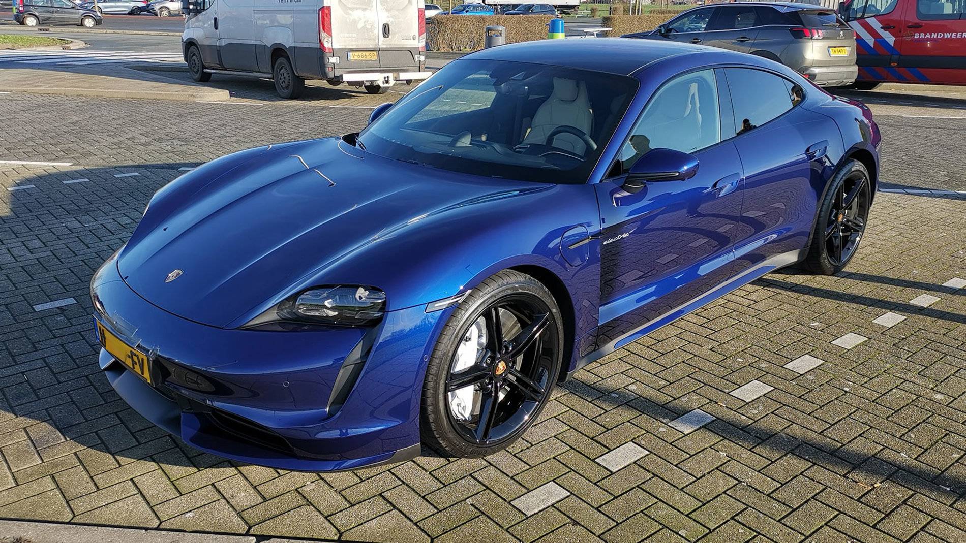 Porsche Taycan GENTIAN BLUE Taycan Club Gentian Blue Taycan Turbo Black Wheels