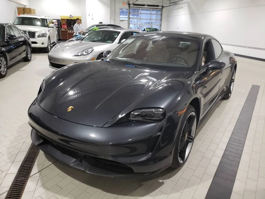 Porsche Taycan Suspension sure seems high. Taycan