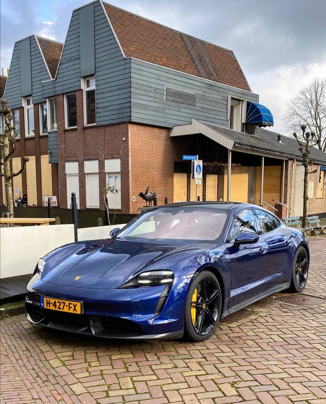 Porsche Taycan GENTIAN BLUE Taycan Club Gentian Blue Taycan Turbo Black Wheels Yellow Brakes