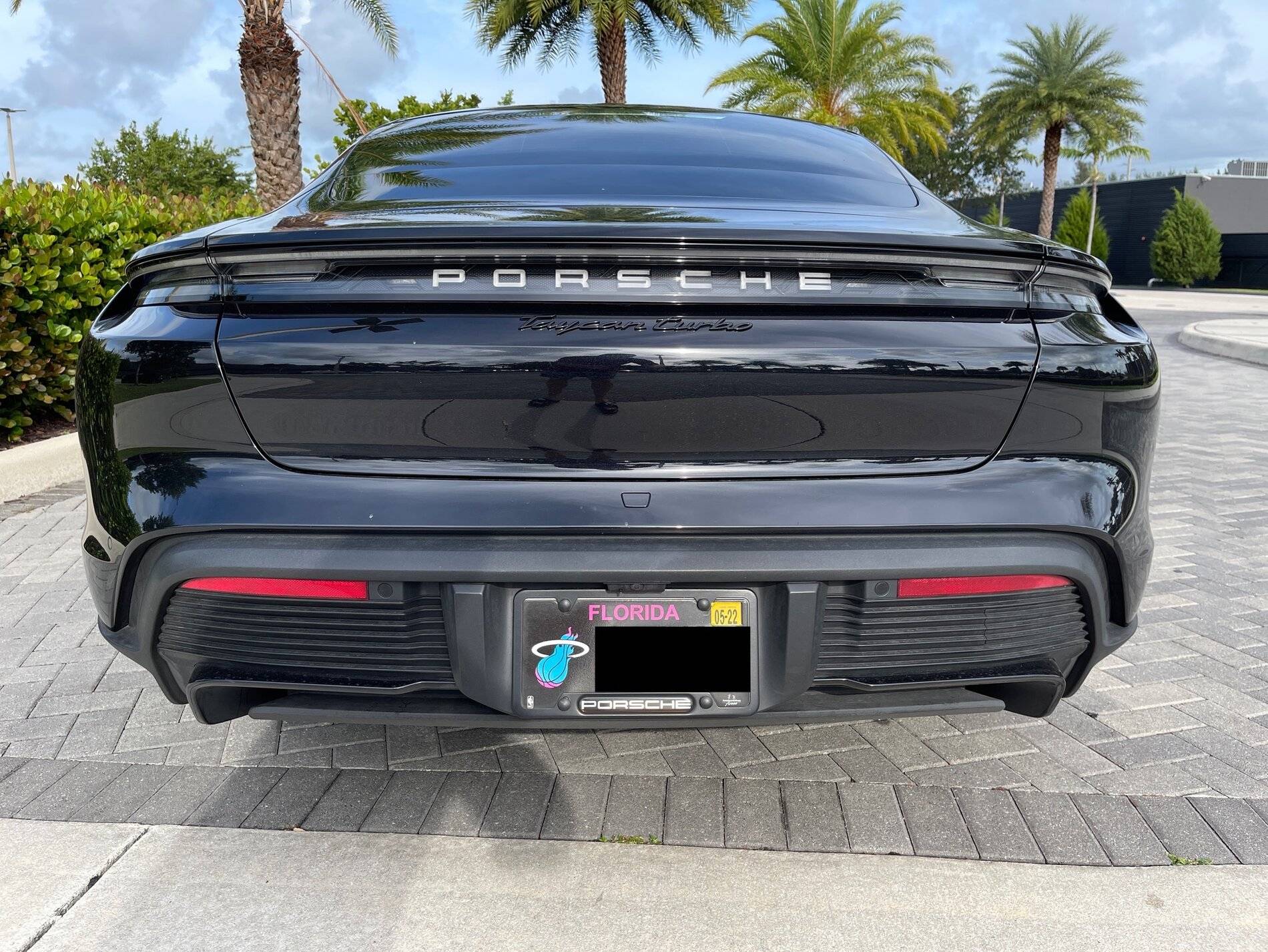 Porsche Taycan Glacier blue Porsche logo lights up? Before