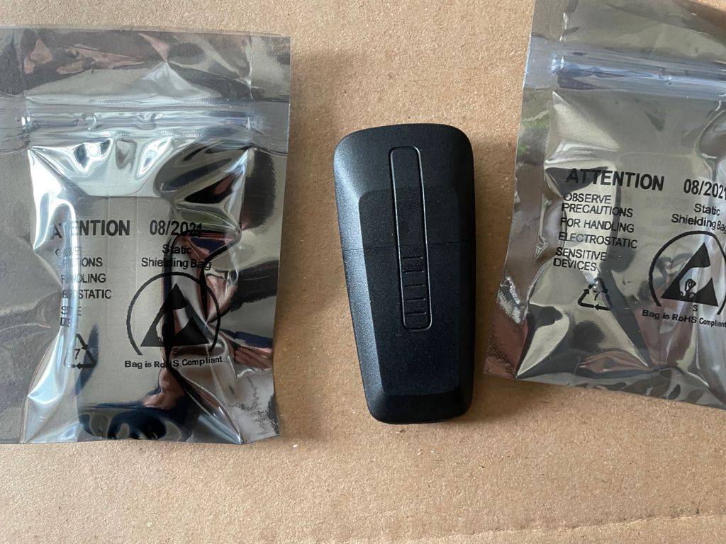 Porsche Taycan Identify this please? Found a pair in my glove compartment! WhatsApp Image 2021-10-23 at 13.04.33