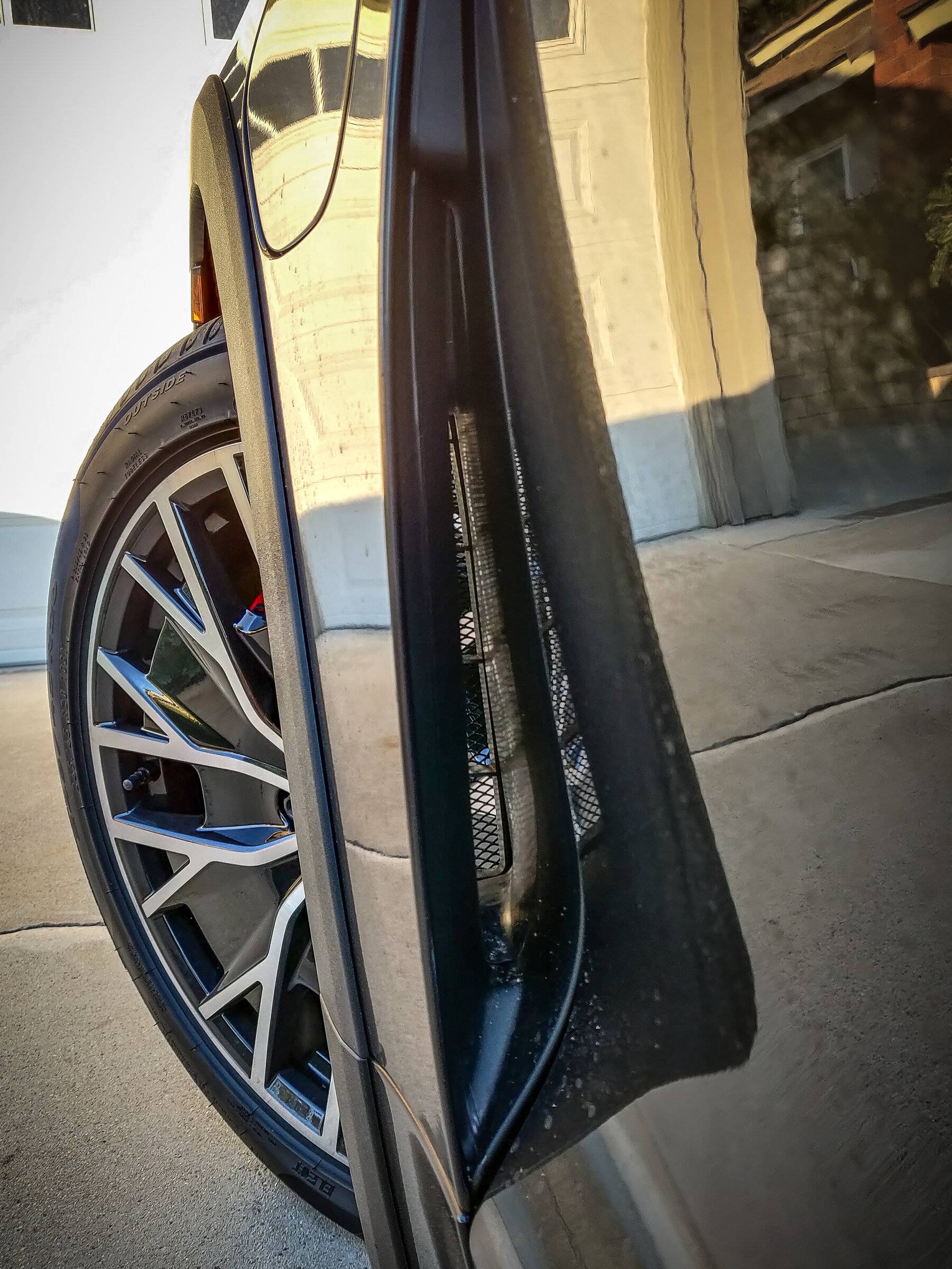 Porsche Taycan My DIY mod of the front fender air vents. PSX_20211210_162020