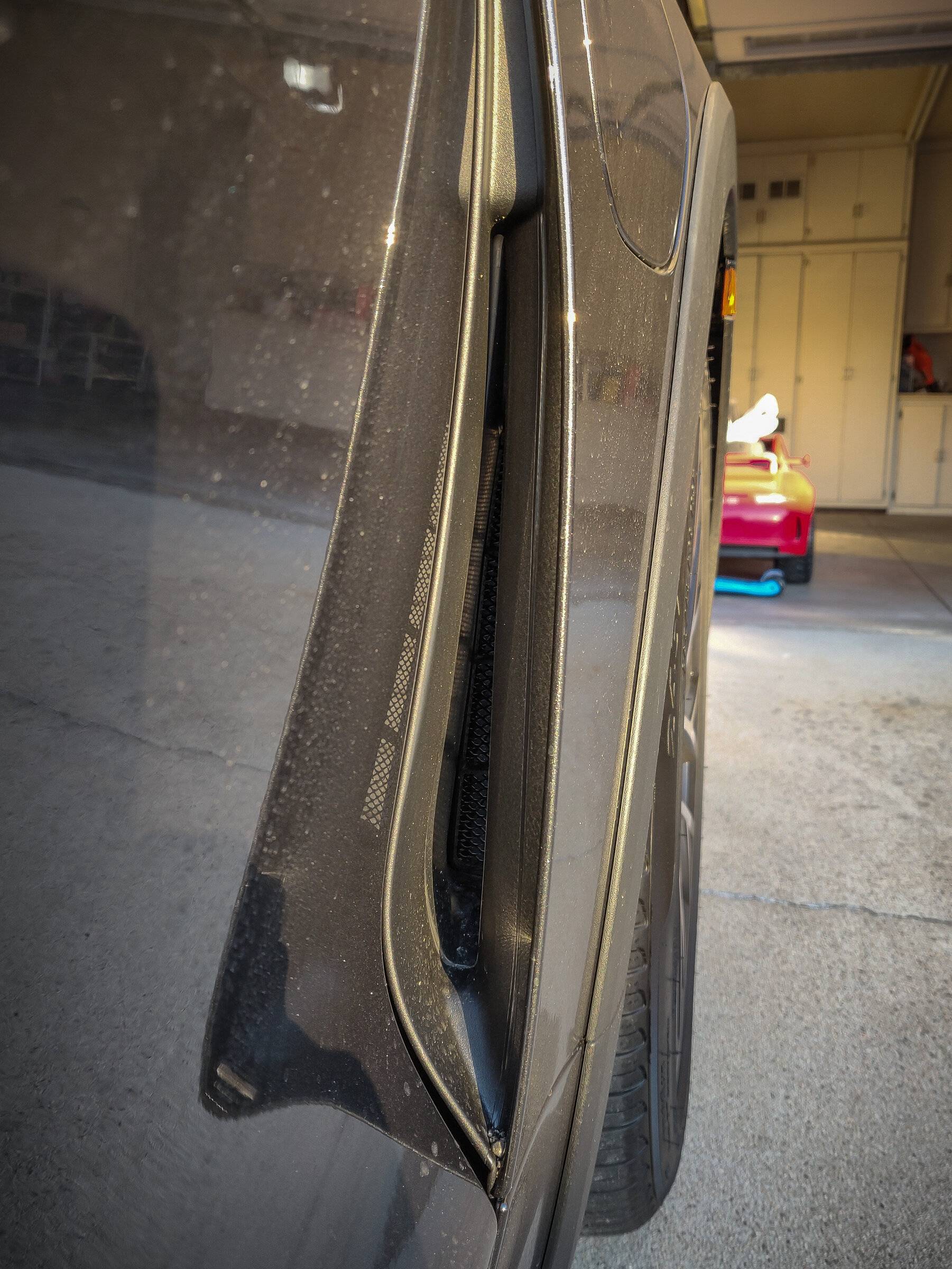 Porsche Taycan My DIY mod of the front fender air vents. PSX_20211210_162109