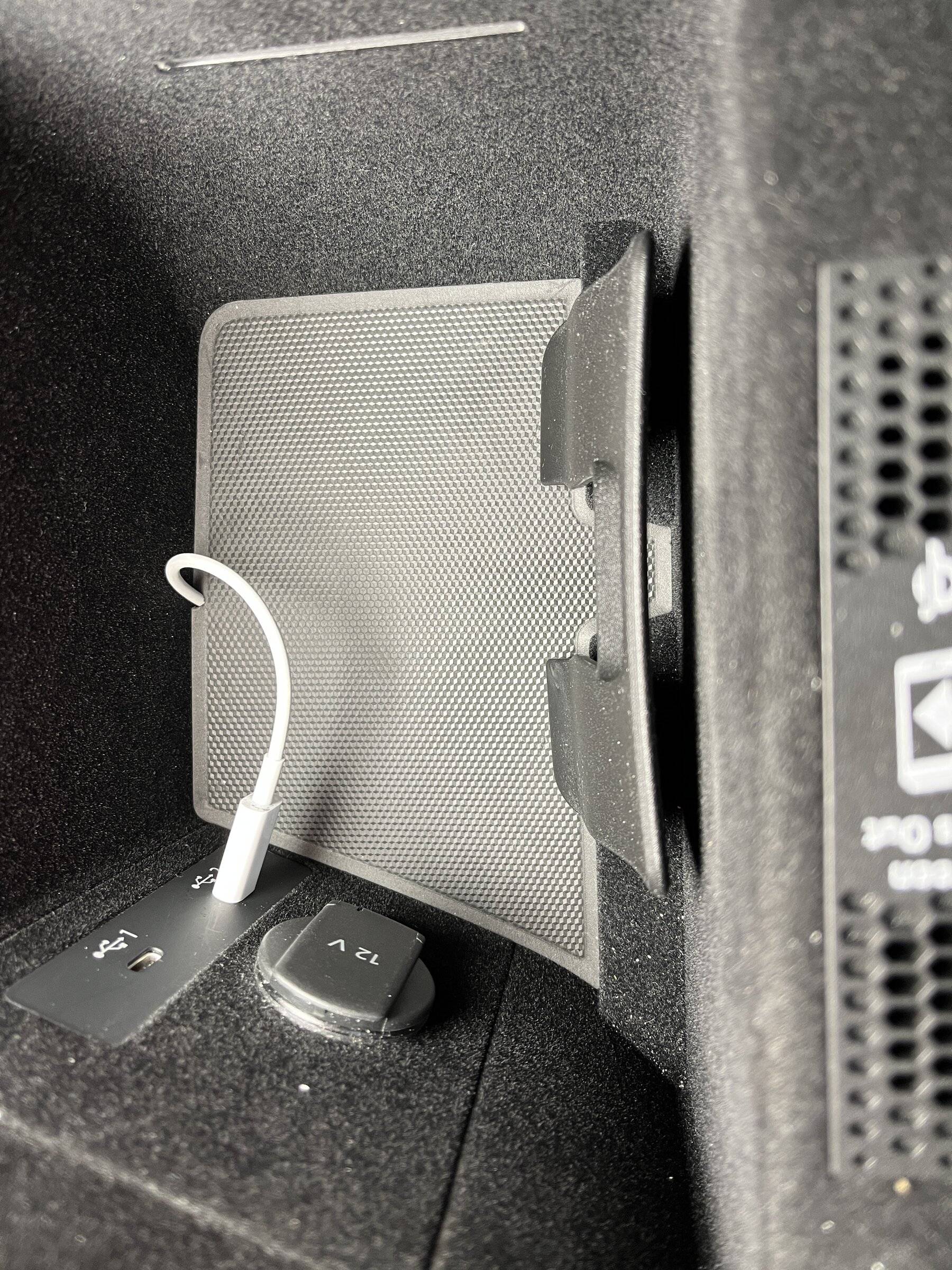Porsche Taycan Routing Magsafe cable from passenger side of console to USB C port CableInConsoleCompartment.JPG