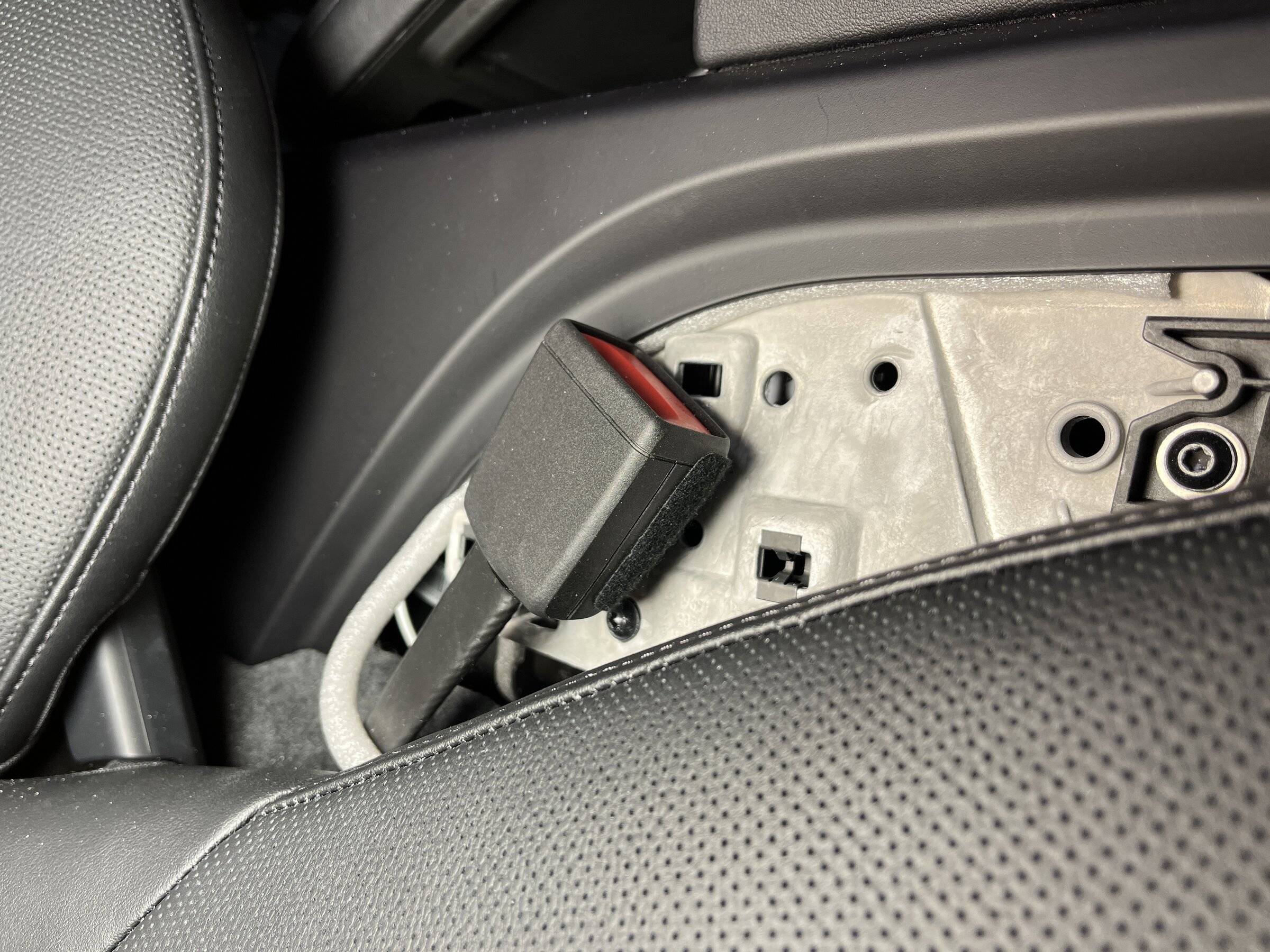 Porsche Taycan Routing Magsafe cable from passenger side of console to USB C port CaulkingFoamToRetainCable.JPG