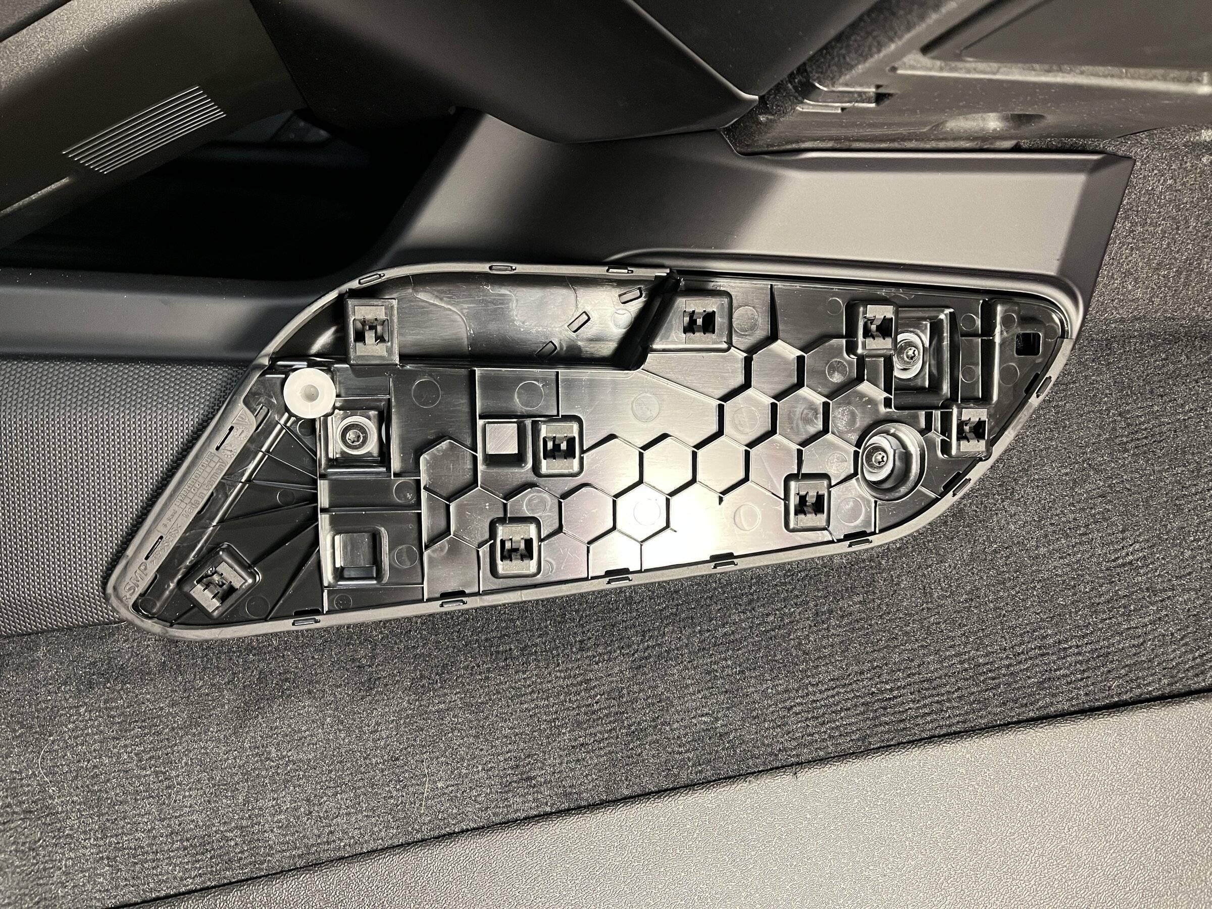 Porsche Taycan Routing Magsafe cable from passenger side of console to USB C port OuterForwardPanelRemoved.JPG