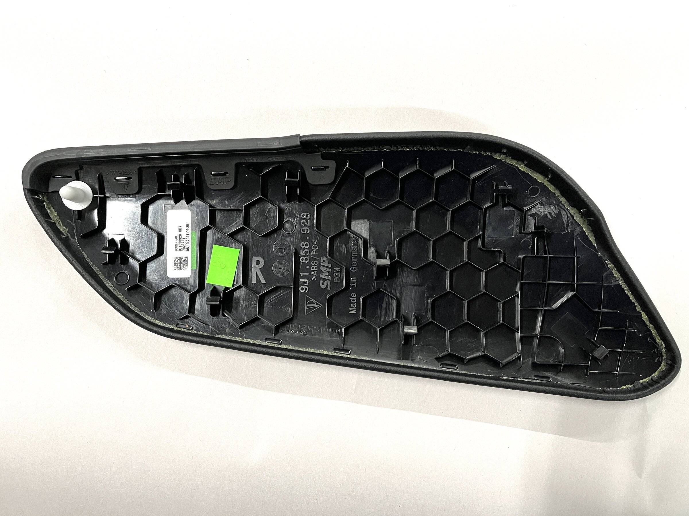 Porsche Taycan Routing Magsafe cable from passenger side of console to USB C port BacksideOfOuterForwardPanel.JPG