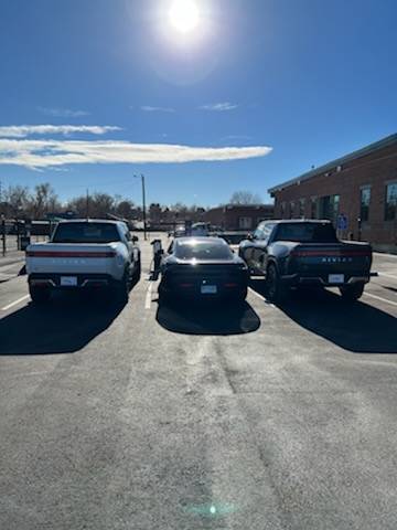 Porsche Taycan Way off topic:   when my Taycan met Rivian IMG_1750.HEIC