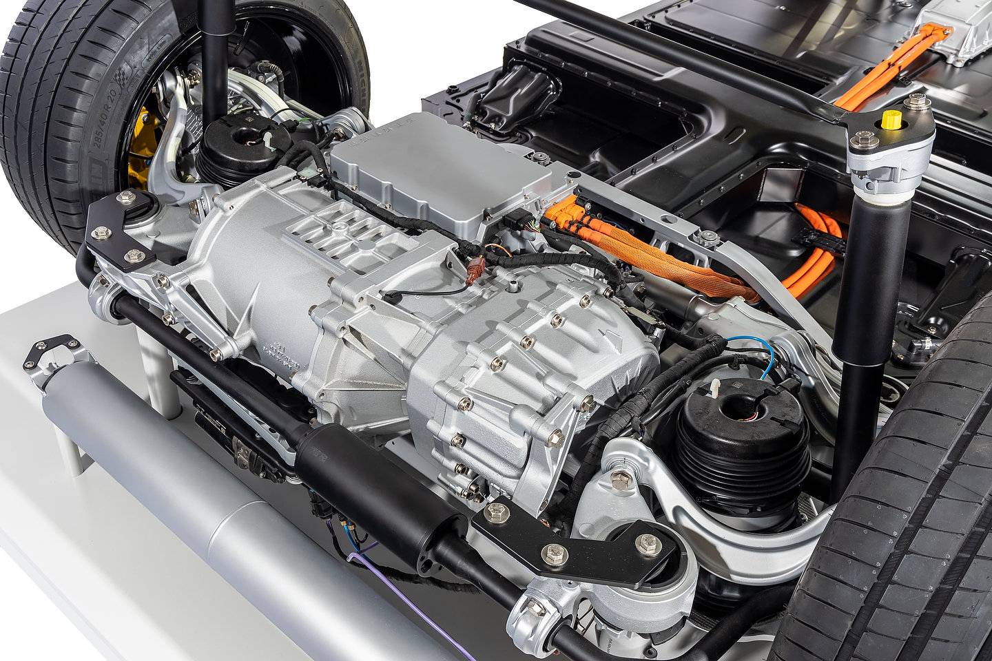 Porsche Taycan Silver coloured tube behind rear motor ? Porsche-Taycan-Synchronous-AC-Motors-Drivetrain