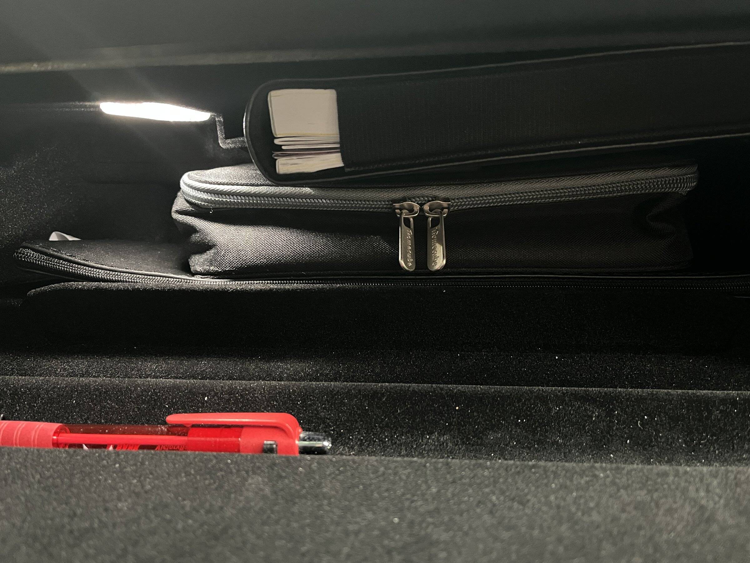Porsche Taycan Making CT cabin storage user friendly OpenGloveBox.JPG
