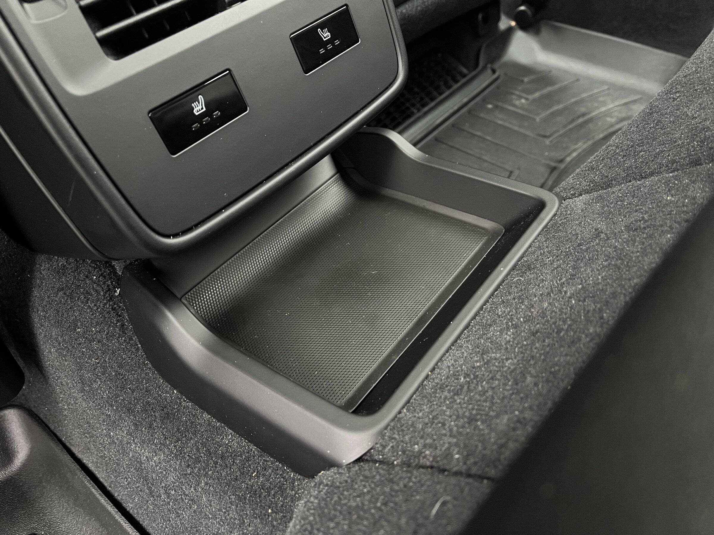 Porsche Taycan Making CT cabin storage user friendly RearSeatStorageCompartment.JPG