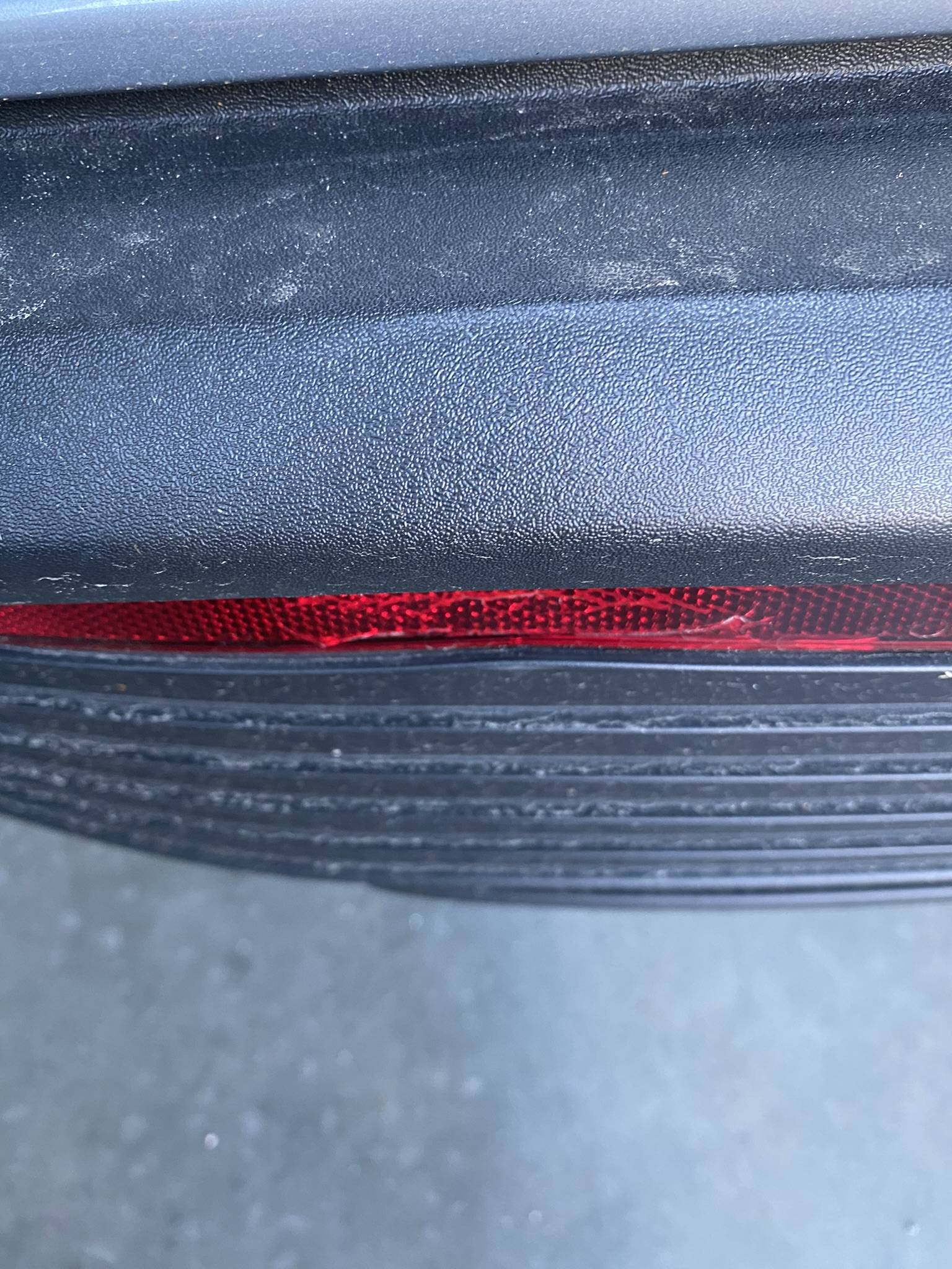 Porsche Taycan Removing rear reflector. 4AD99BD3-4AC0-4B16-B751-F2CB5BAE39C7