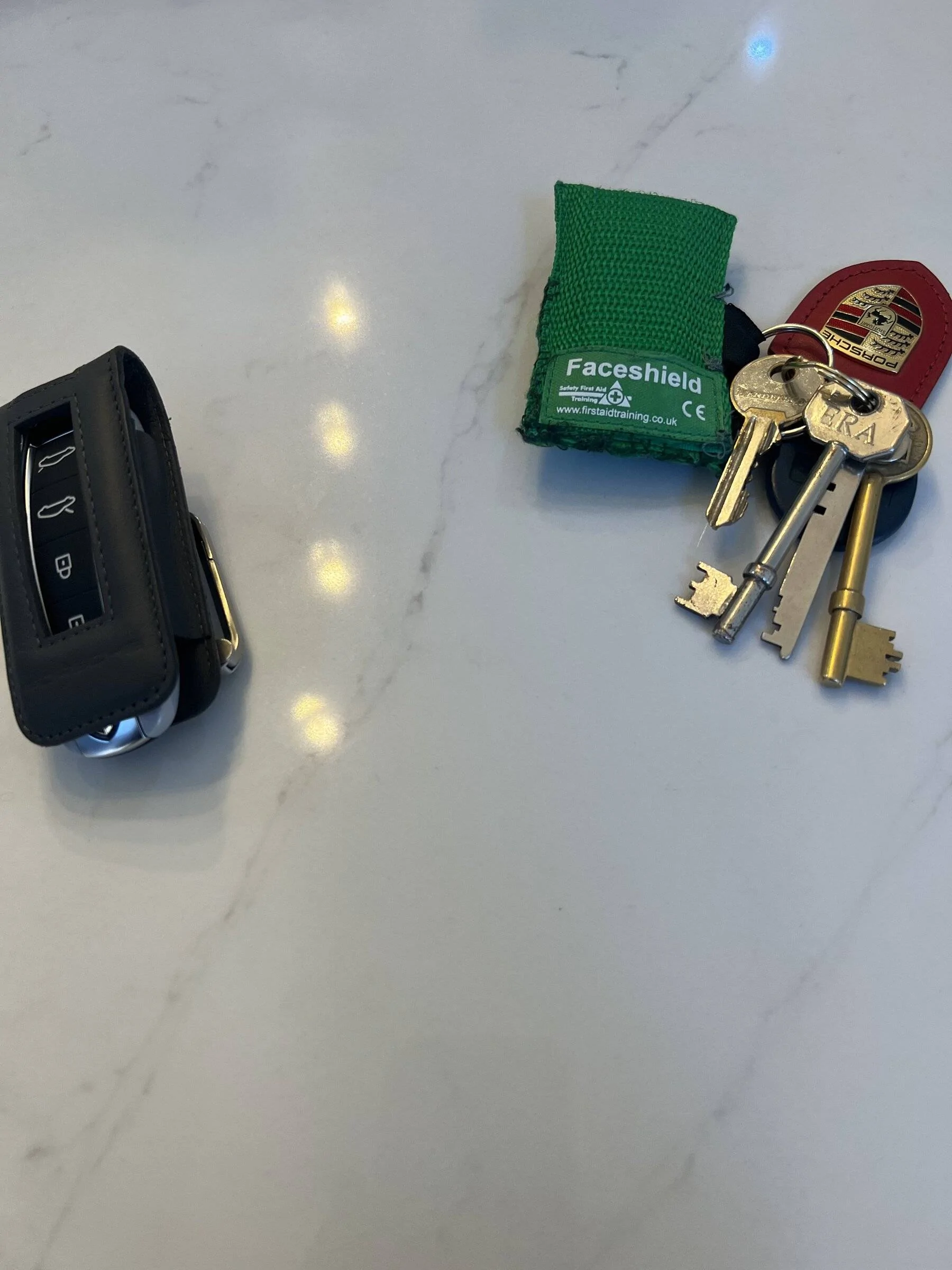 Porsche Taycan Where do you keep your tracker fob? 216F300B-73CF-4EC4-A8CC-9CB6FEFB8511