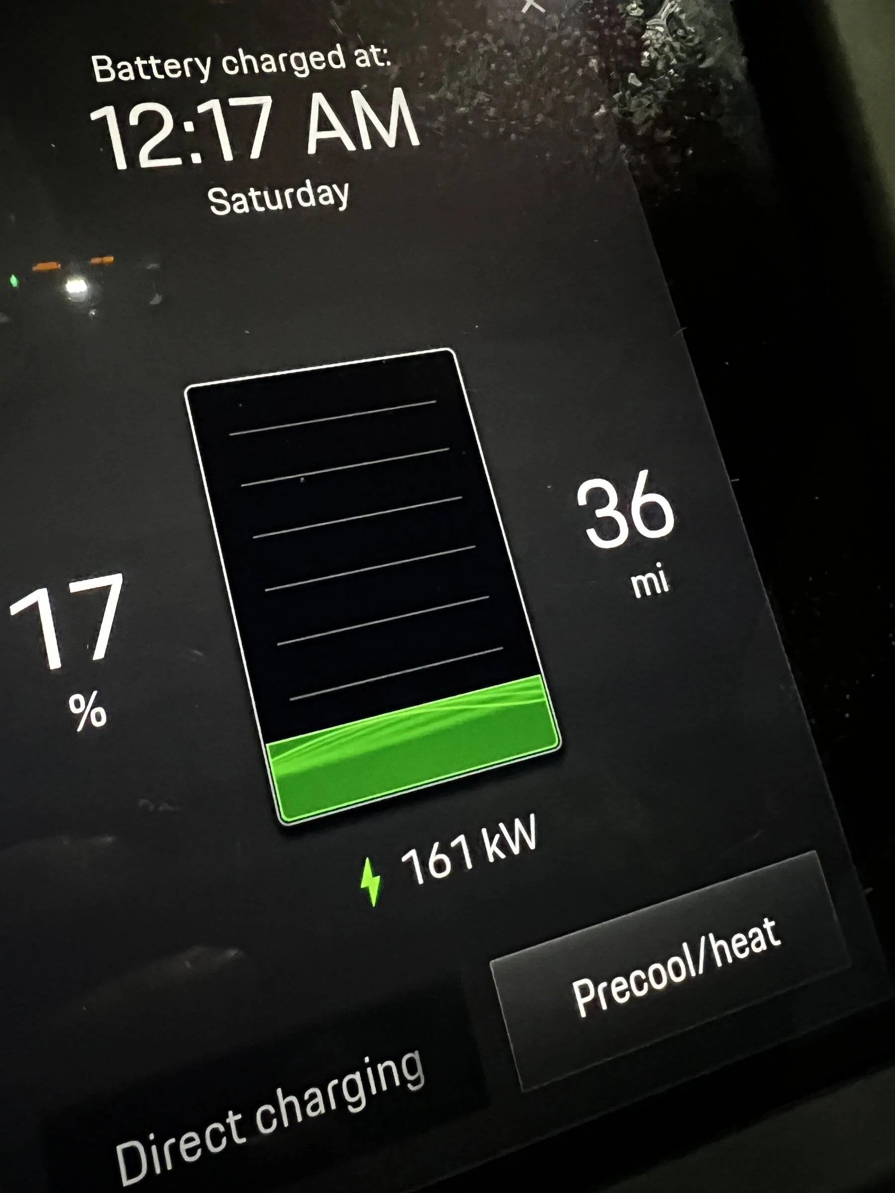 Porsche Taycan Green lightning bolt while fast charging ECA5225D-DFB2-40F3-863C-38916CCF2C12