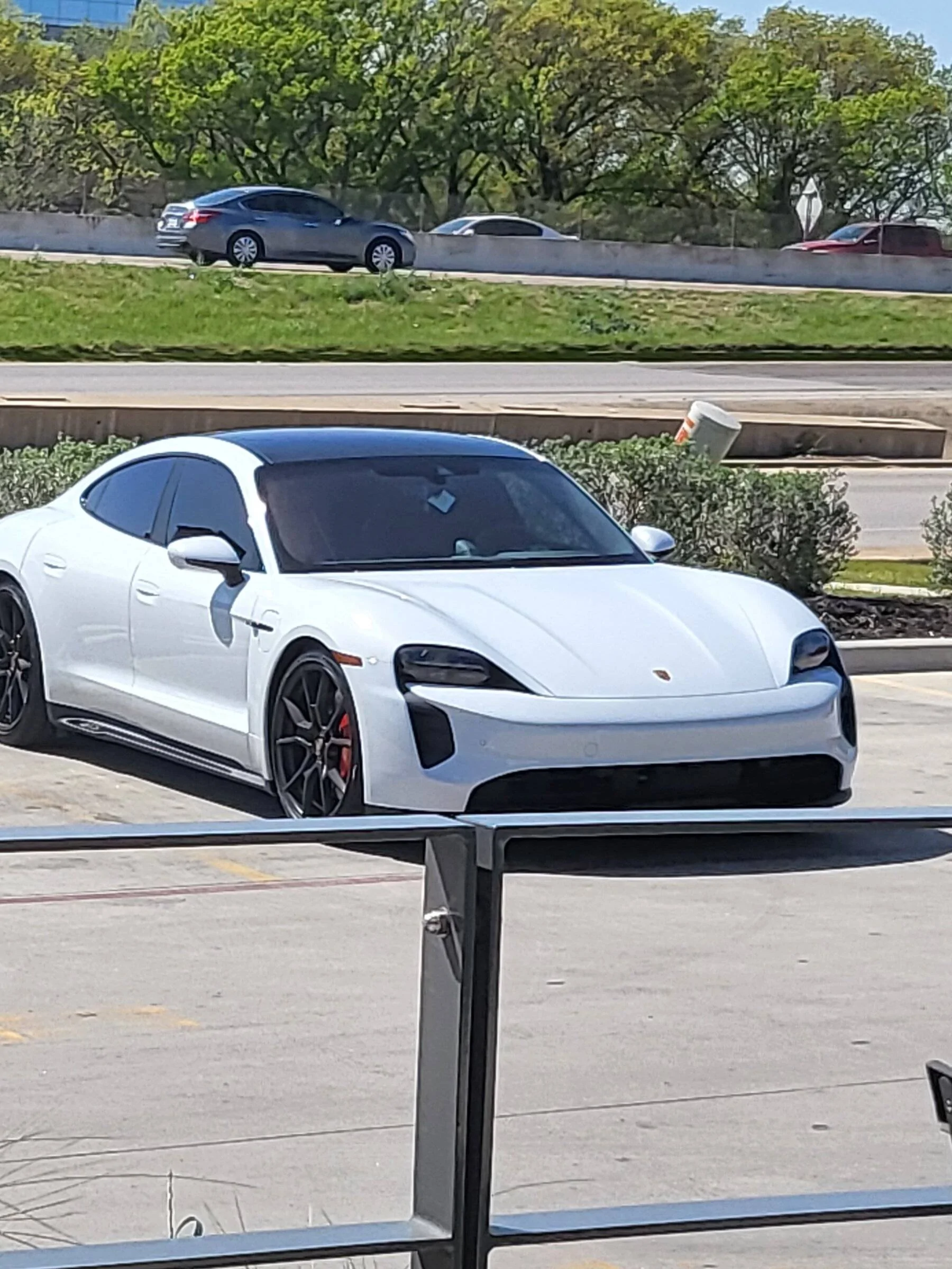 Porsche Taycan It's here... white GTS sedan 20220409_154518