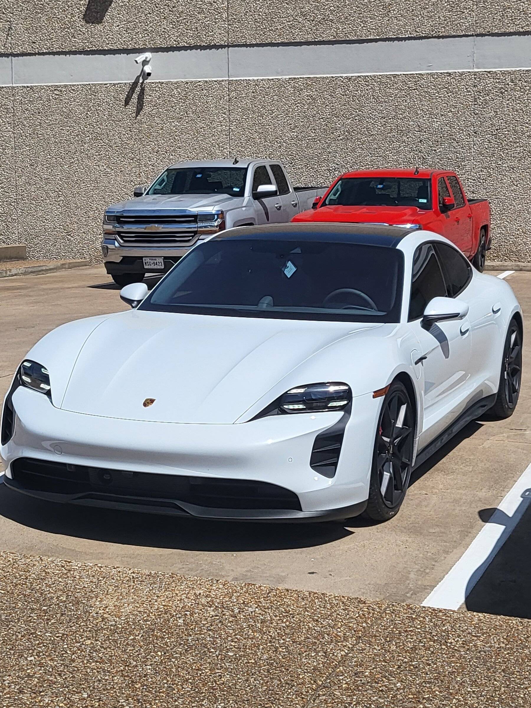 Porsche Taycan It's here... white GTS sedan 20220409_143421