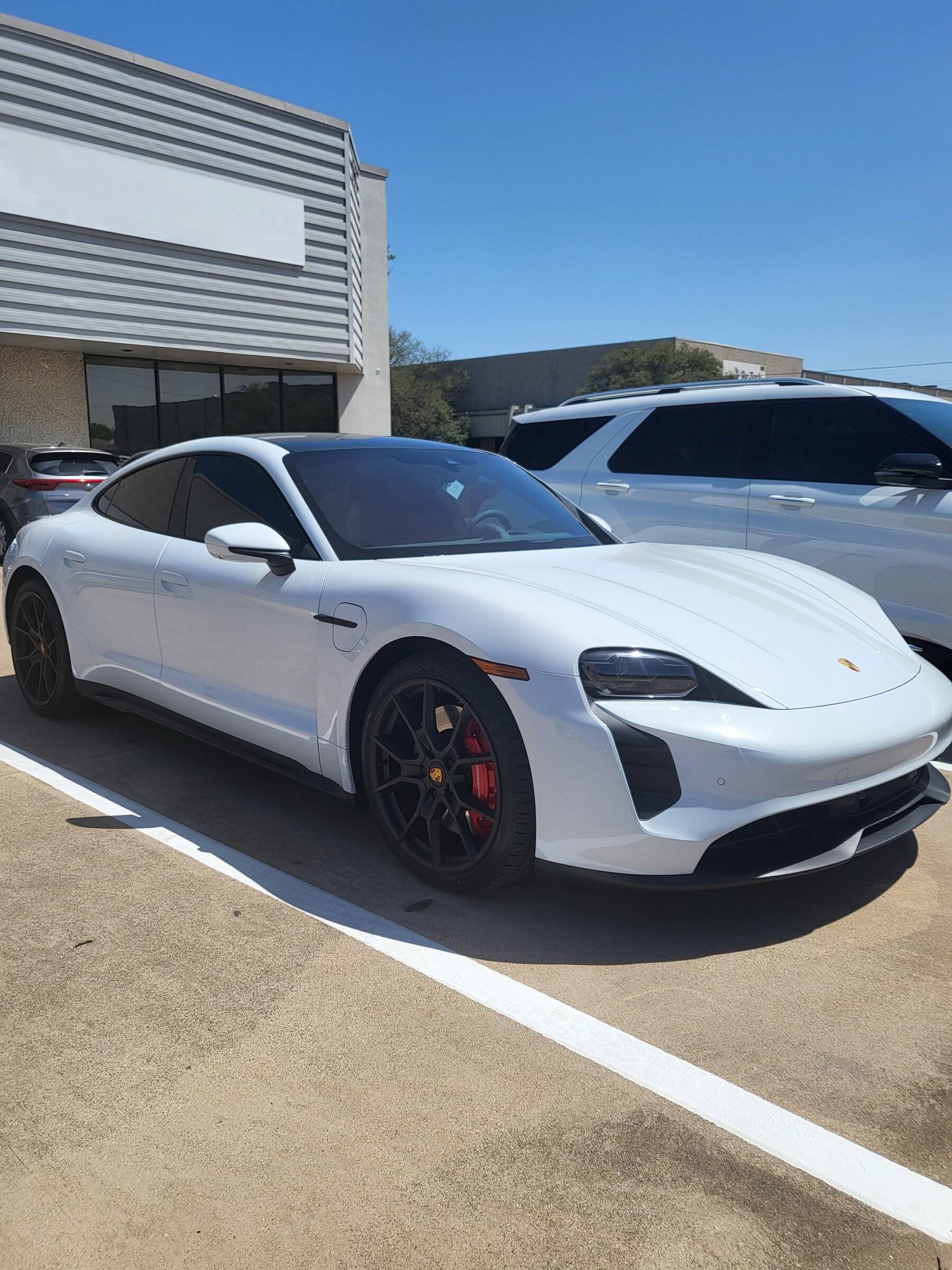 Porsche Taycan It's here... white GTS sedan 20220409_142707