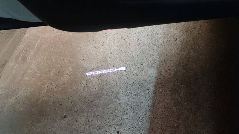 Porsche Taycan Installed puddle lights “Taycan” befor