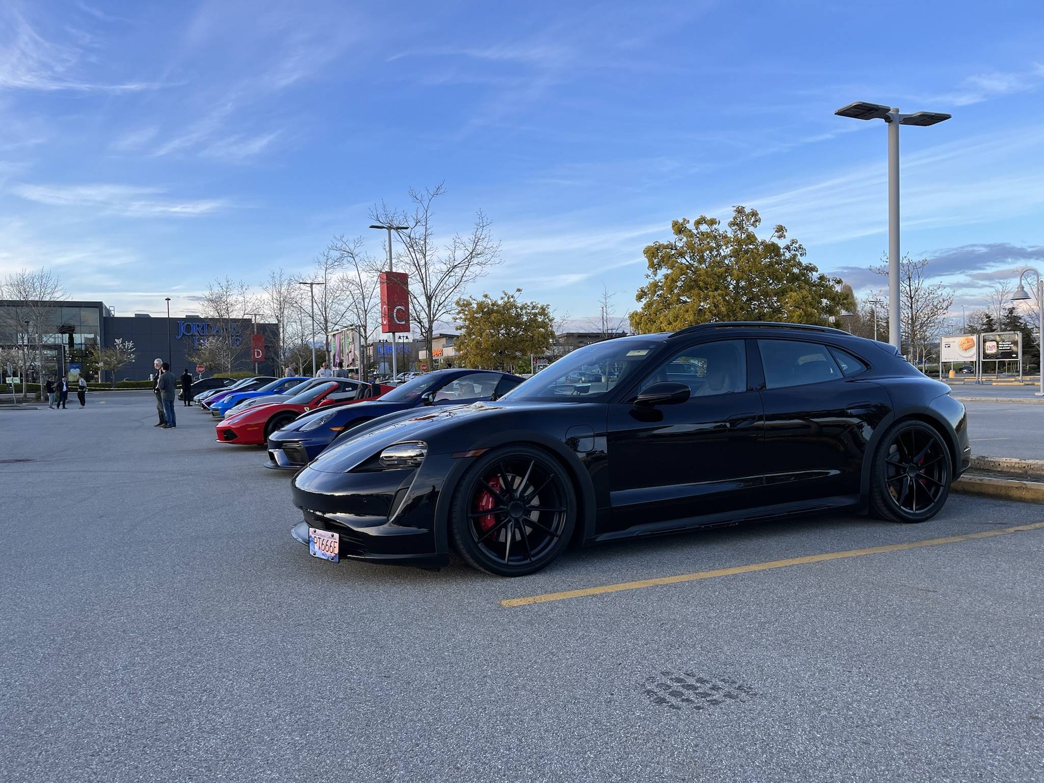 Porsche Taycan Switch from silver trim to gloss black IMG_5140
