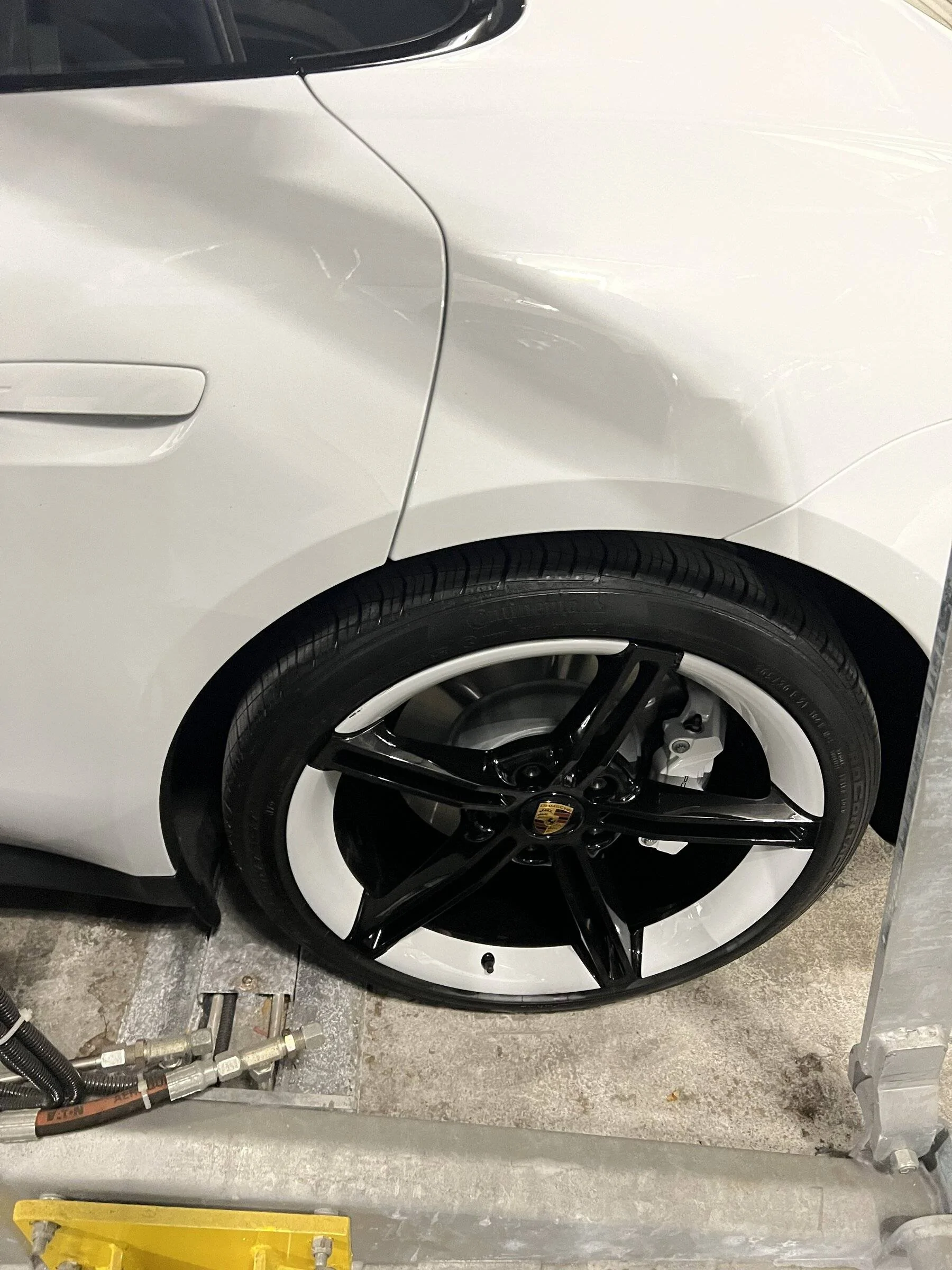 Porsche Taycan Garage dented rim and chipped wheel 464290D7-DA07-4343-ADCD-EAF1E7946840