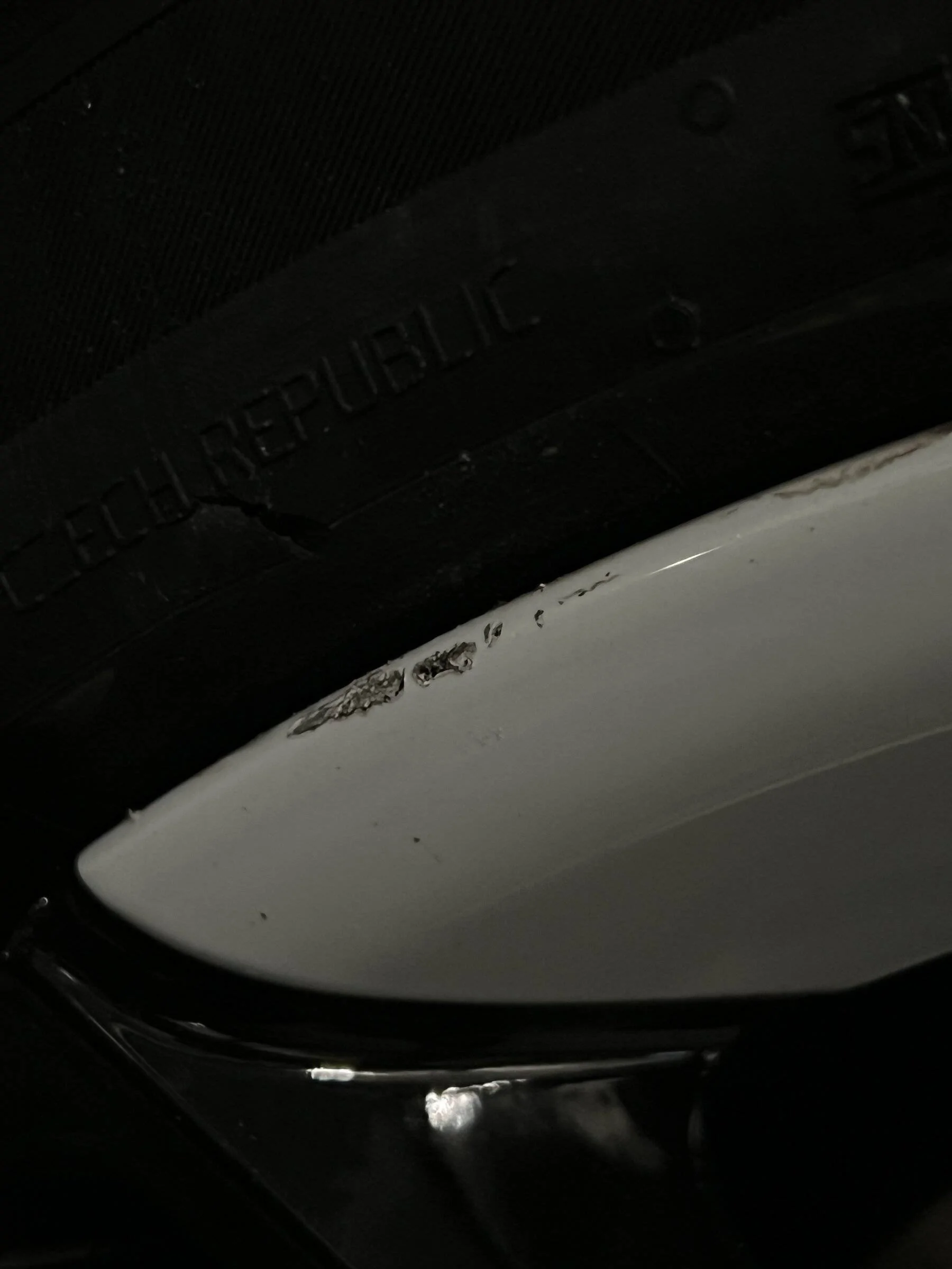 Porsche Taycan Garage dented rim and chipped wheel DC687A51-4154-4E14-9C66-9148C5F7A6AE