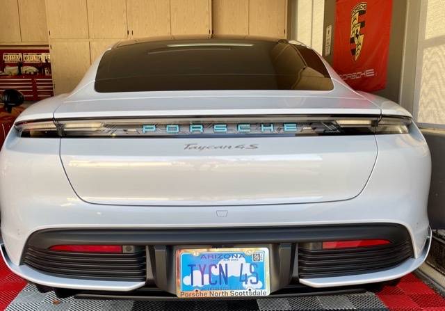 Porsche Taycan Glacier blue Porsche logo 6C6A467C-ACFF-4FFA-9791-7BE400D37557