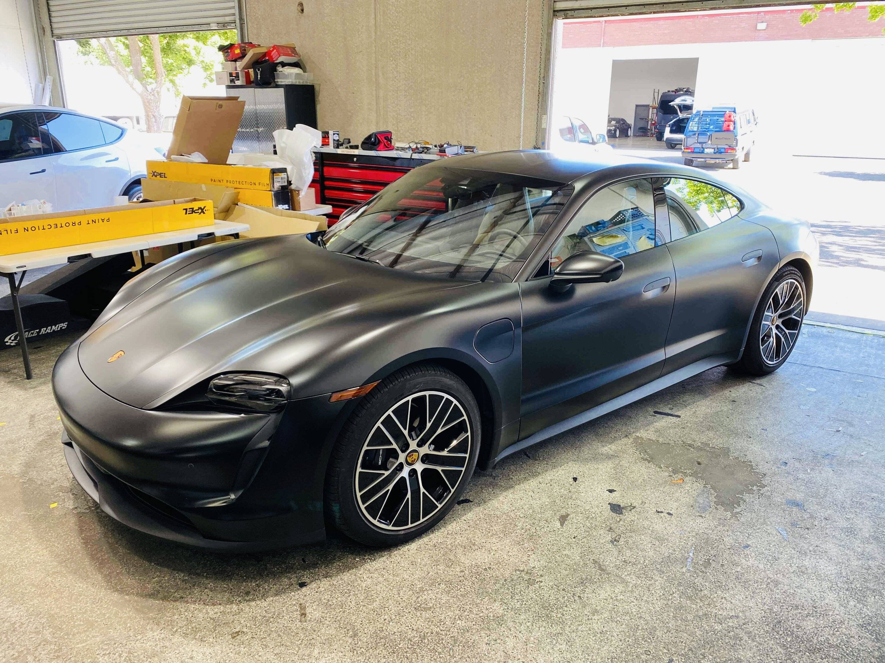Porsche Taycan XPEL Stealth PPF installed on gloss black Taycan F7760F9A-64C0-4EA5-8436-11151D59B0BD
